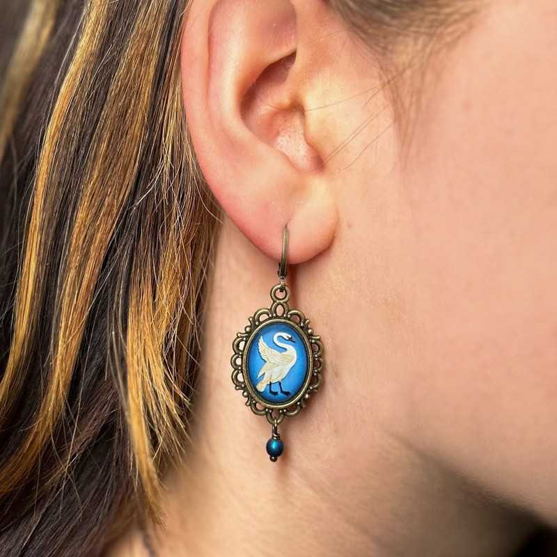 Swans earrings bronze