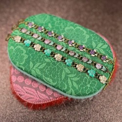 Garland bracelet peach/lilac